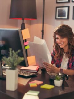 smiling woman working from her home office