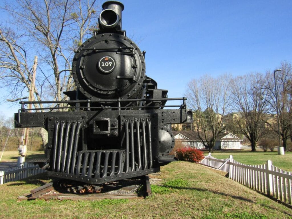 Historic steam locomotive on display, showcasing Pigeon Forge's railroad heritage.