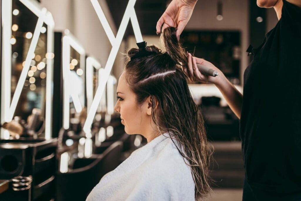 woman preparing to get extensions put in
