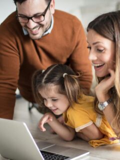 family financial planning with mom, dad, and daughter