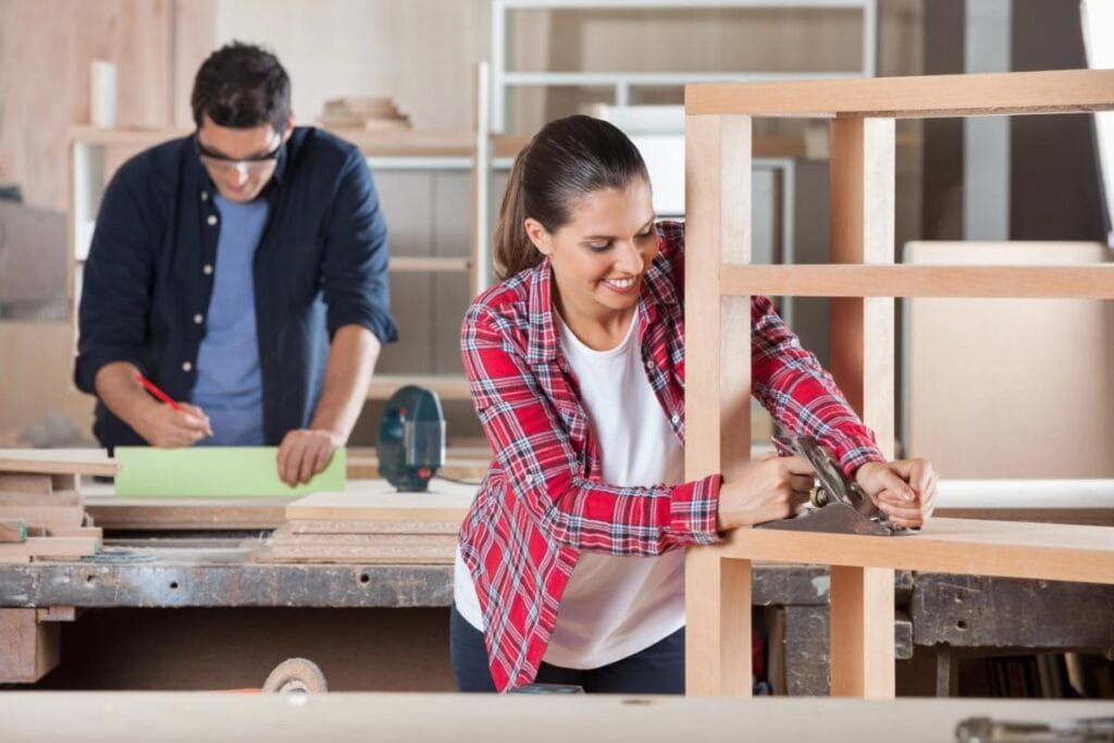 a couple building a shelf together