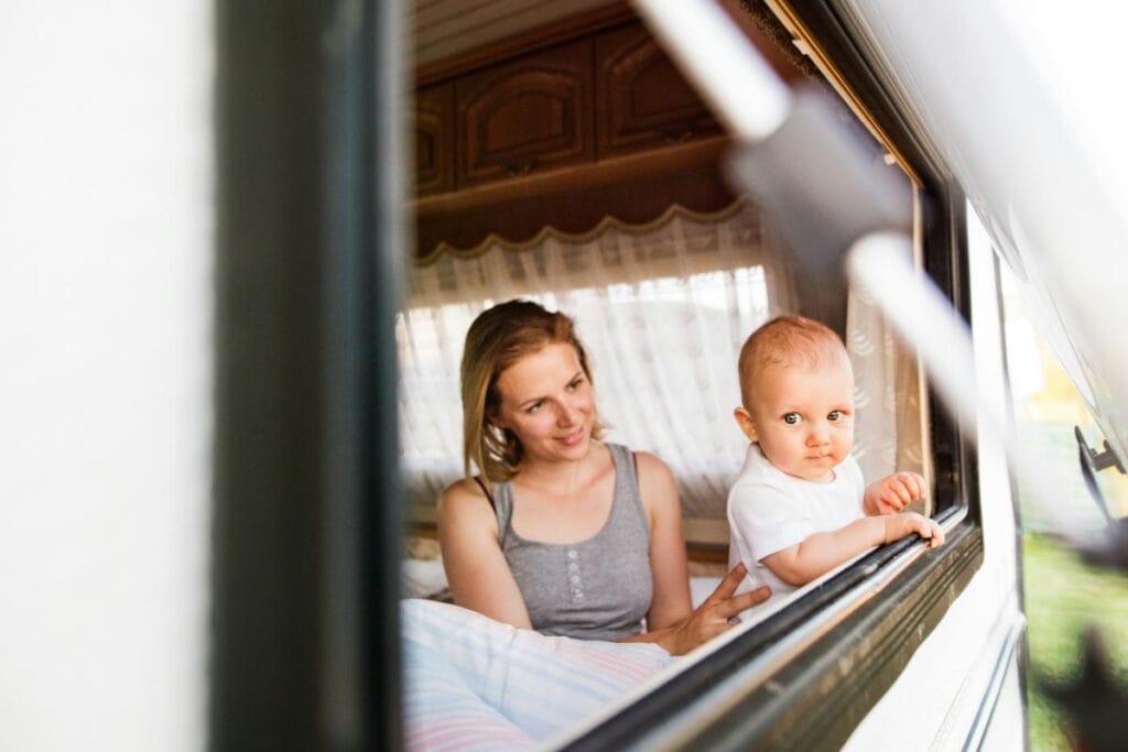 mom and baby in caravan