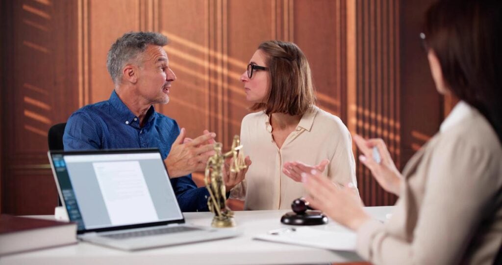 couple arguing in law office -legal dispute