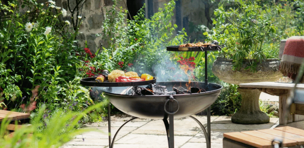 outdoor fire pit with food cooking on it