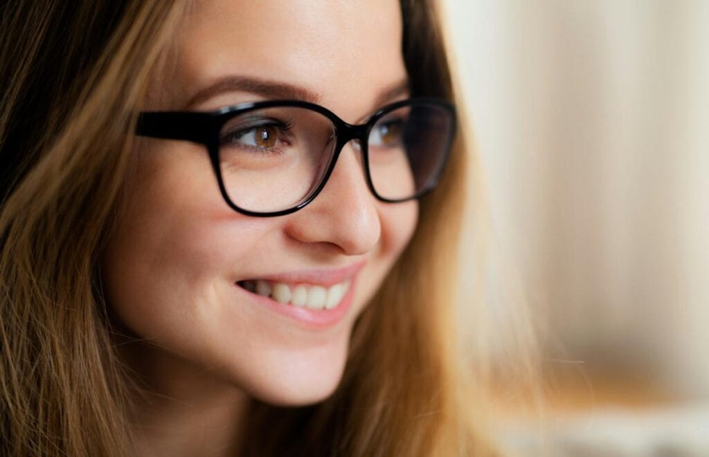 young woman with glasses